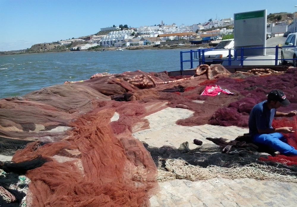 Redero en el muelle de Ayamonte